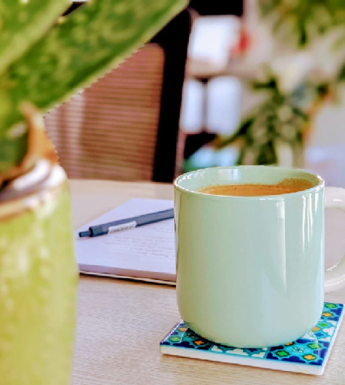 Coffee cup on a desk in a calm workspace setting