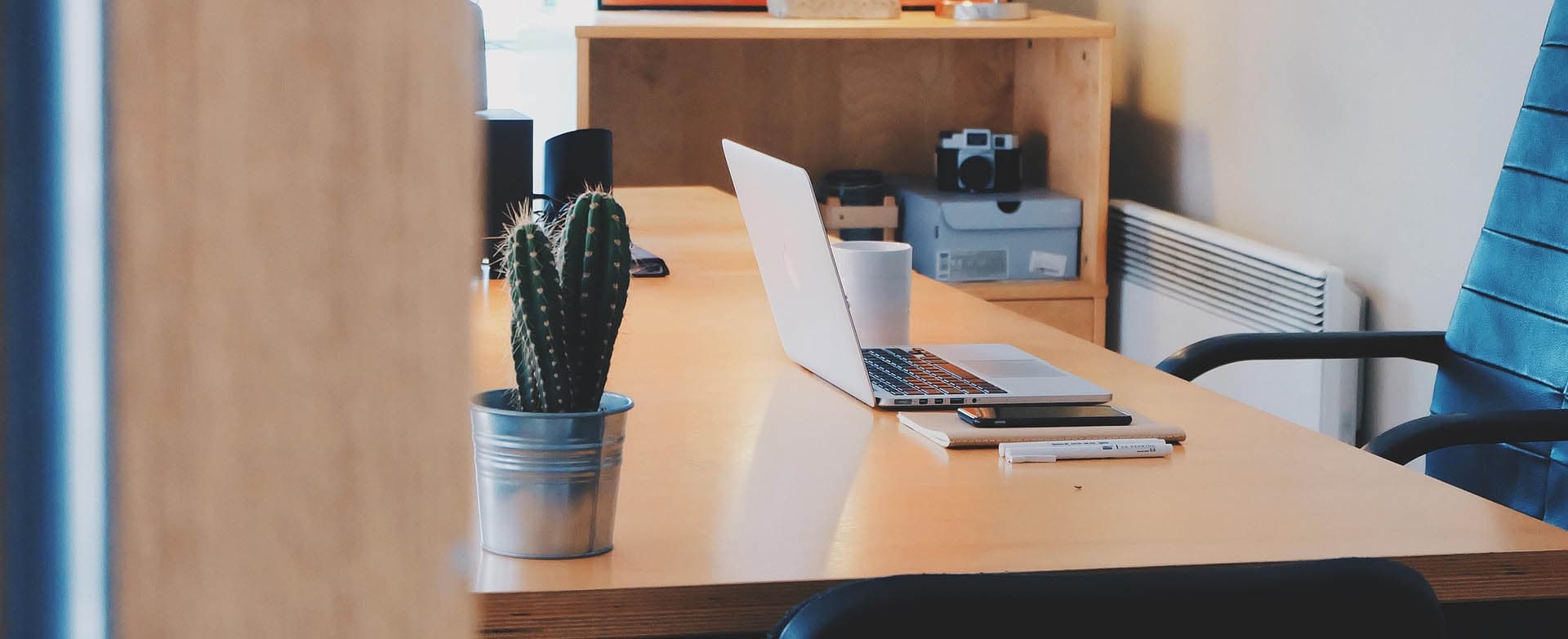 Laptop and desk in the NATIVE workspace