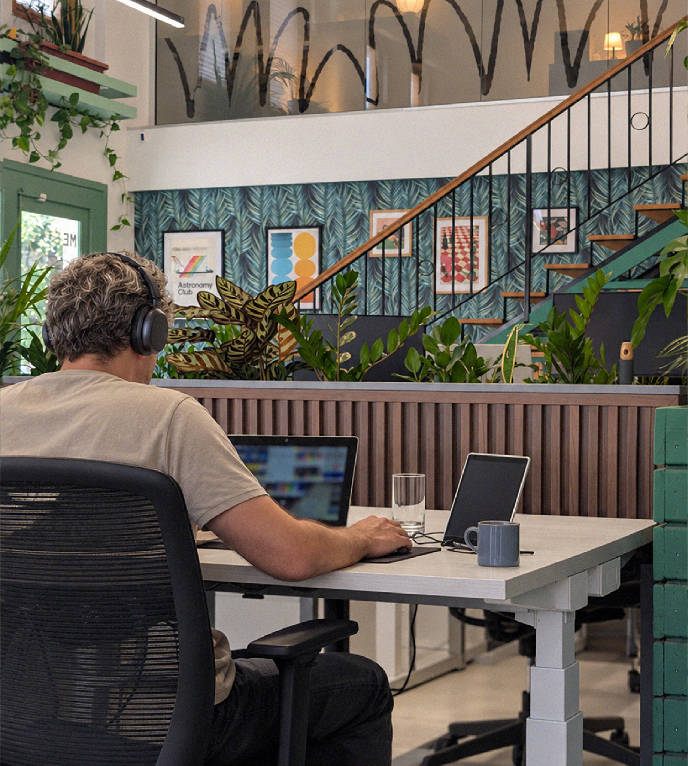 Person working on a laptop at Native coworking
