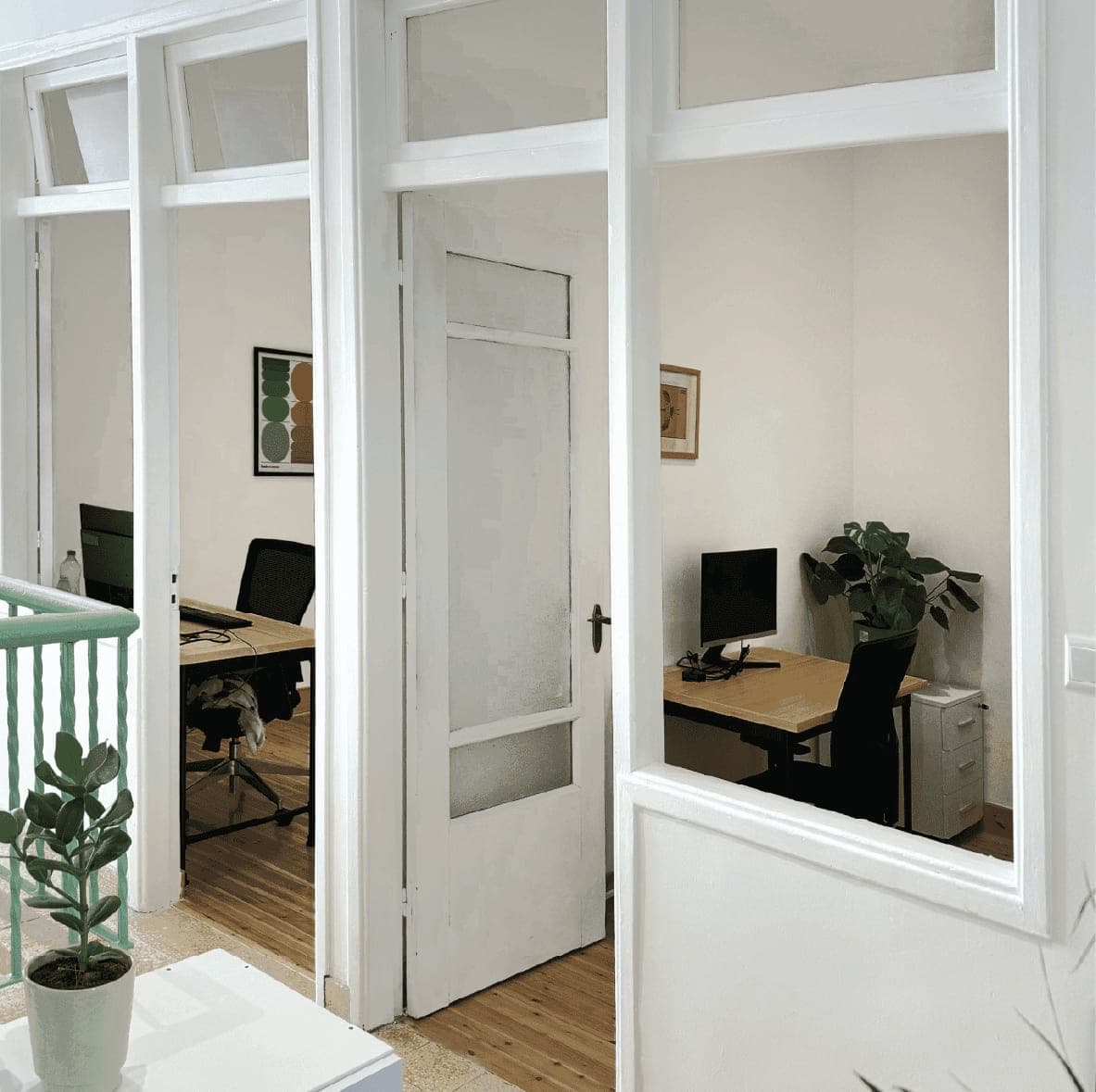 Bright hallway connecting private offices at NATIVE